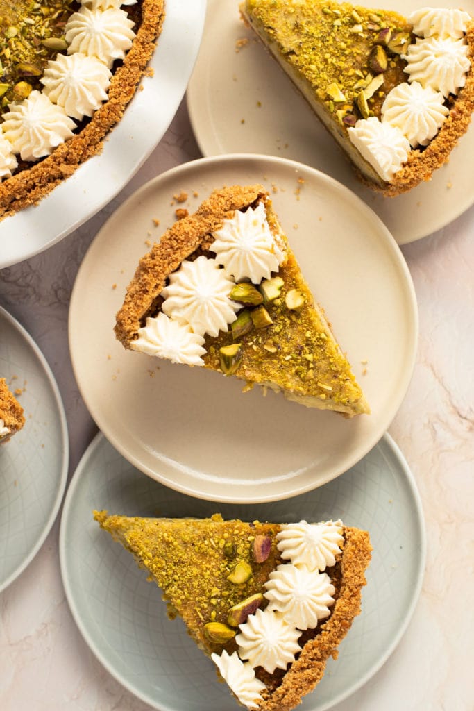 Slices of pistachio pie on a plate.