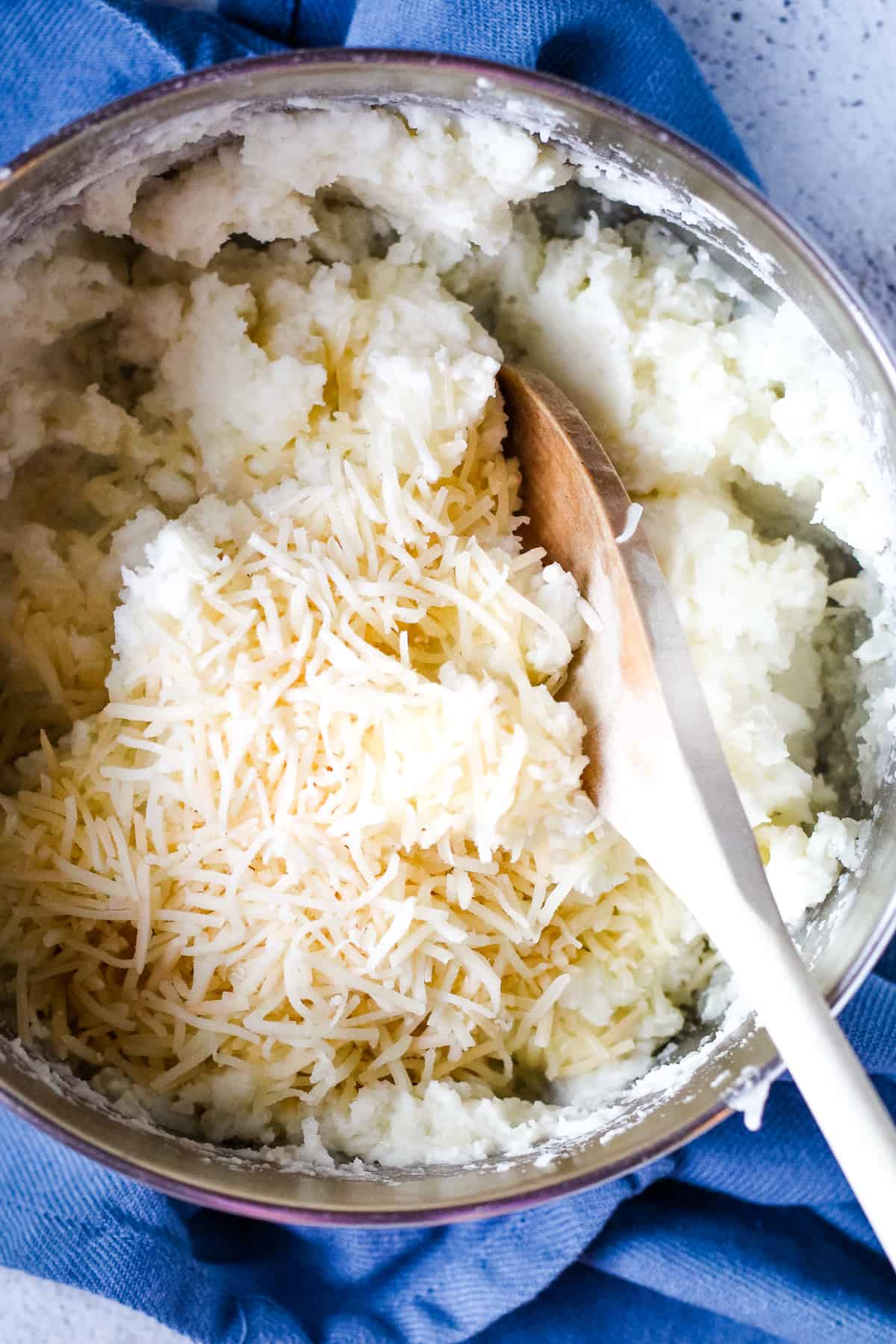 Potatoes with asiago cheese in a pot