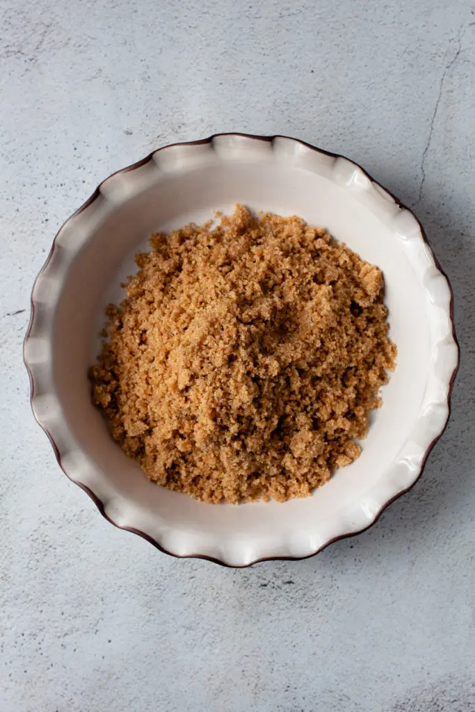 A wafer crumb crust in a pie plate.