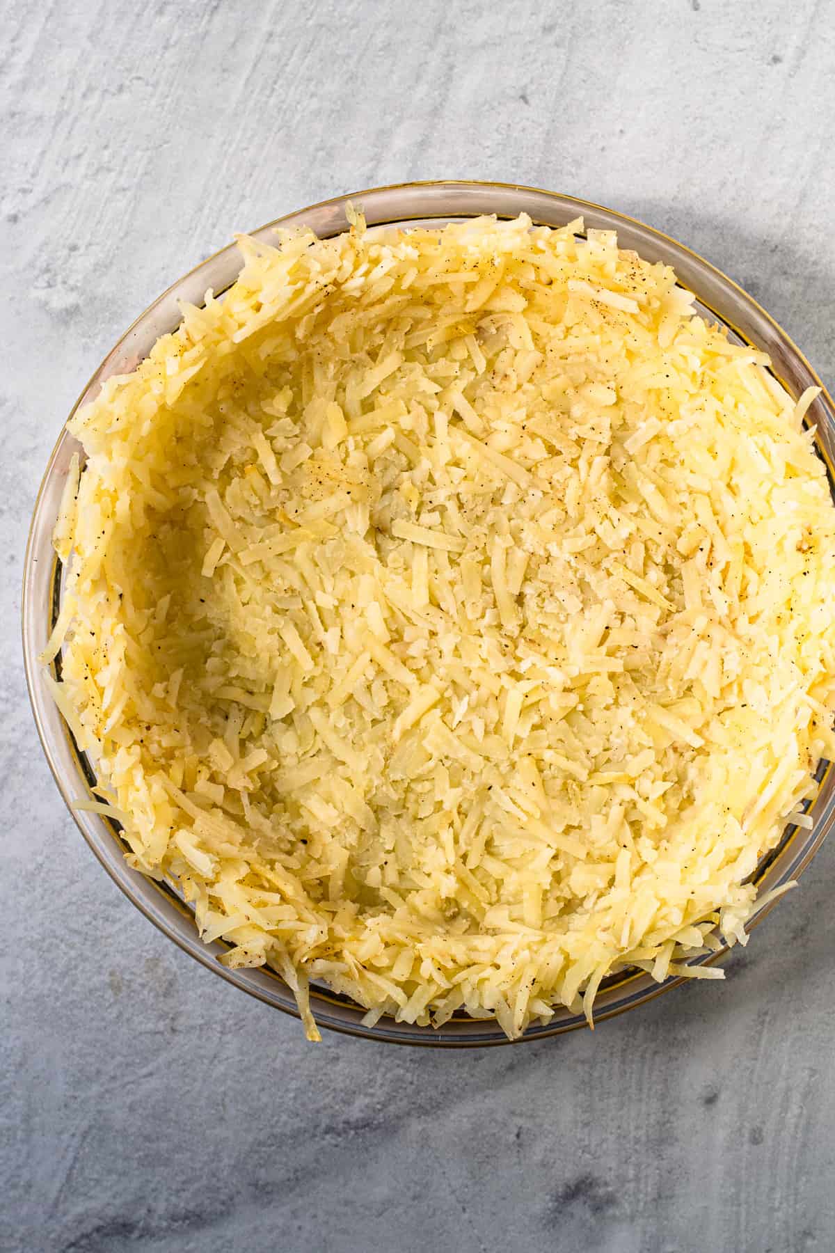 A pie crust made from frozen hash browns.