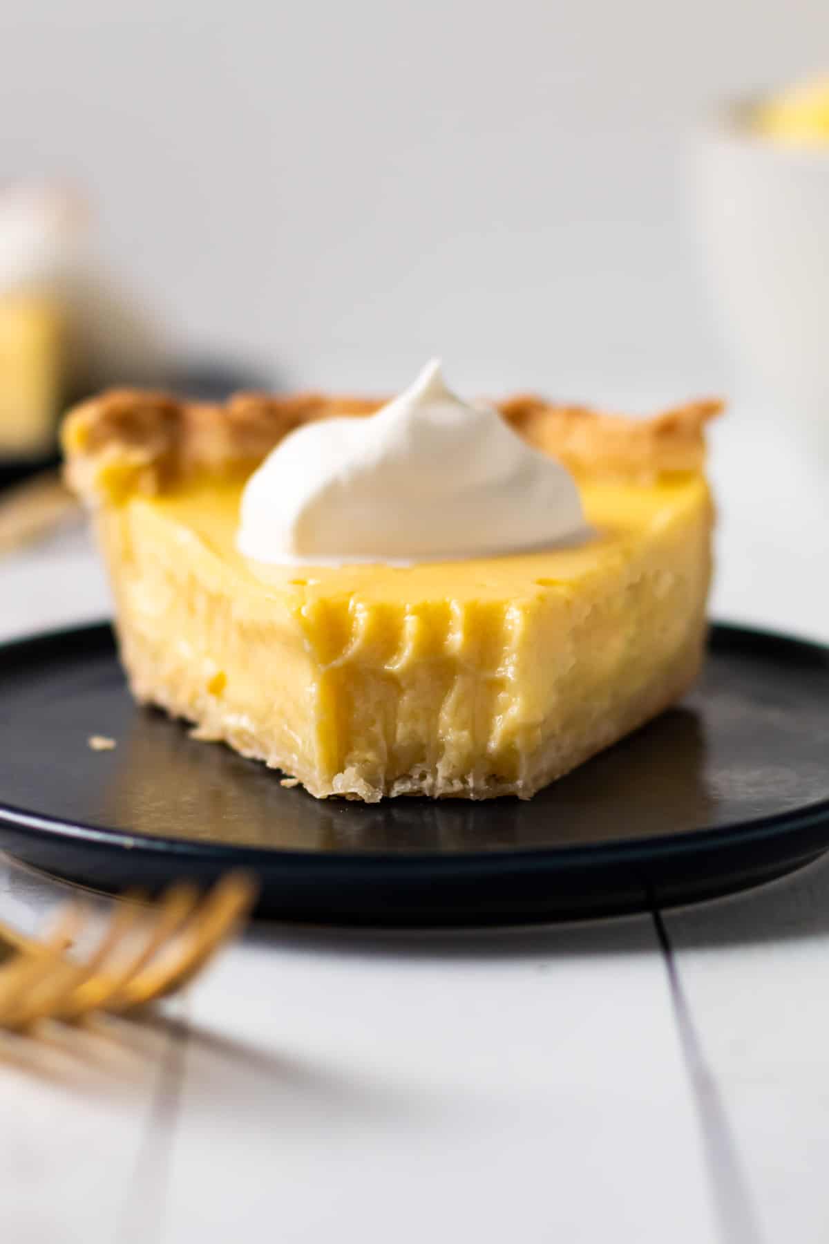 A slice of lemon custard pie.