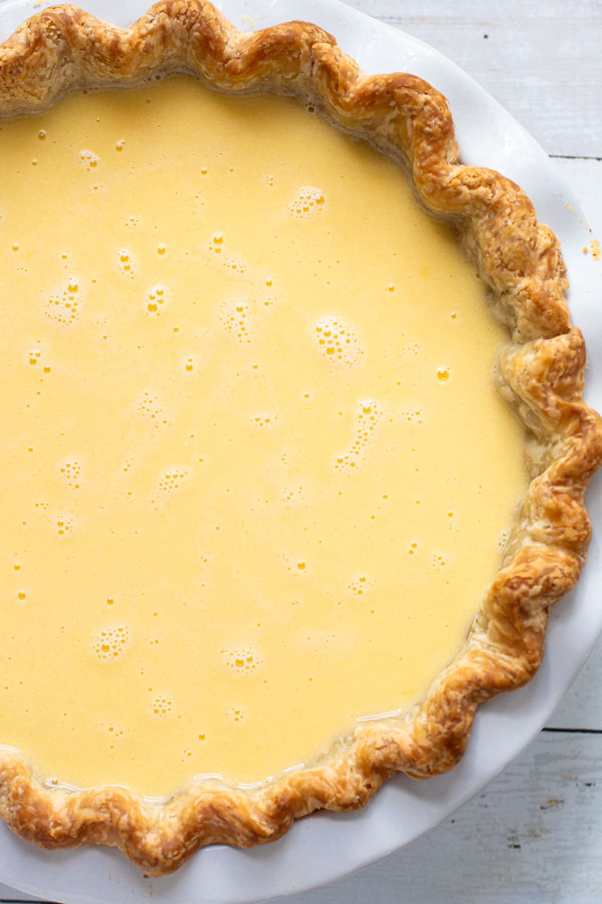 Unbaked lemon custard pie.