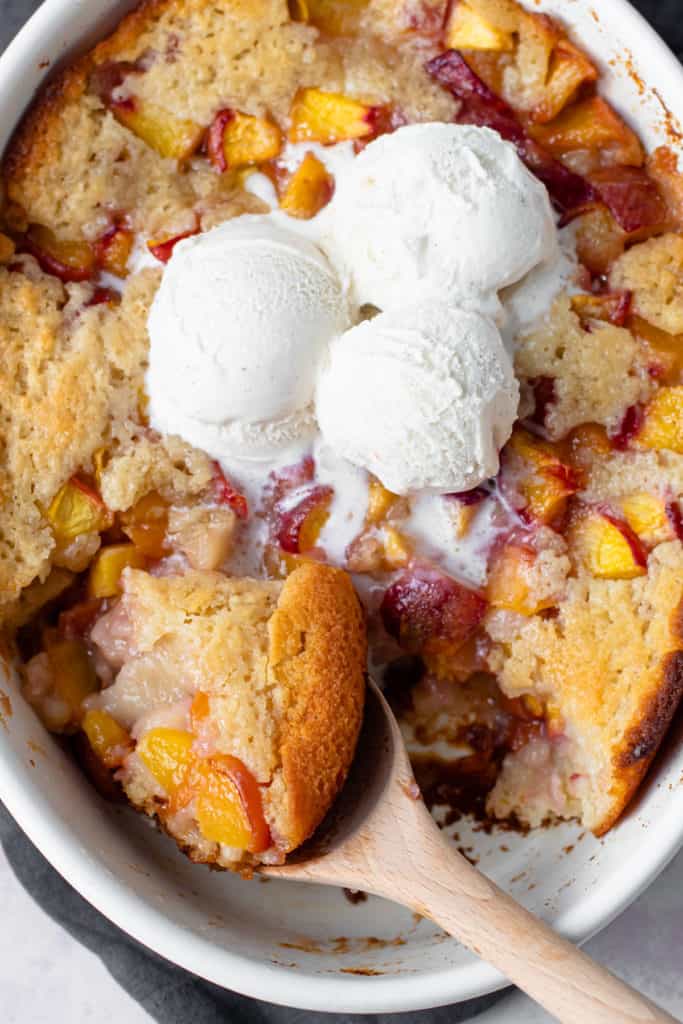 Peach cobbler with vanilla ice cream.