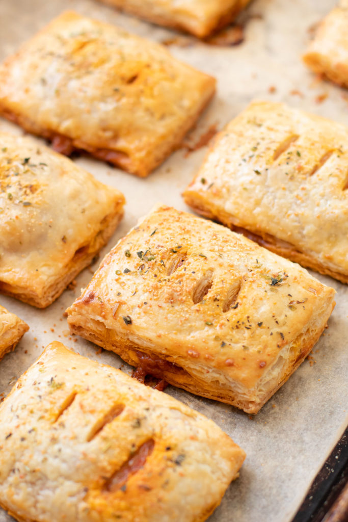 baked hand pies on a tray.