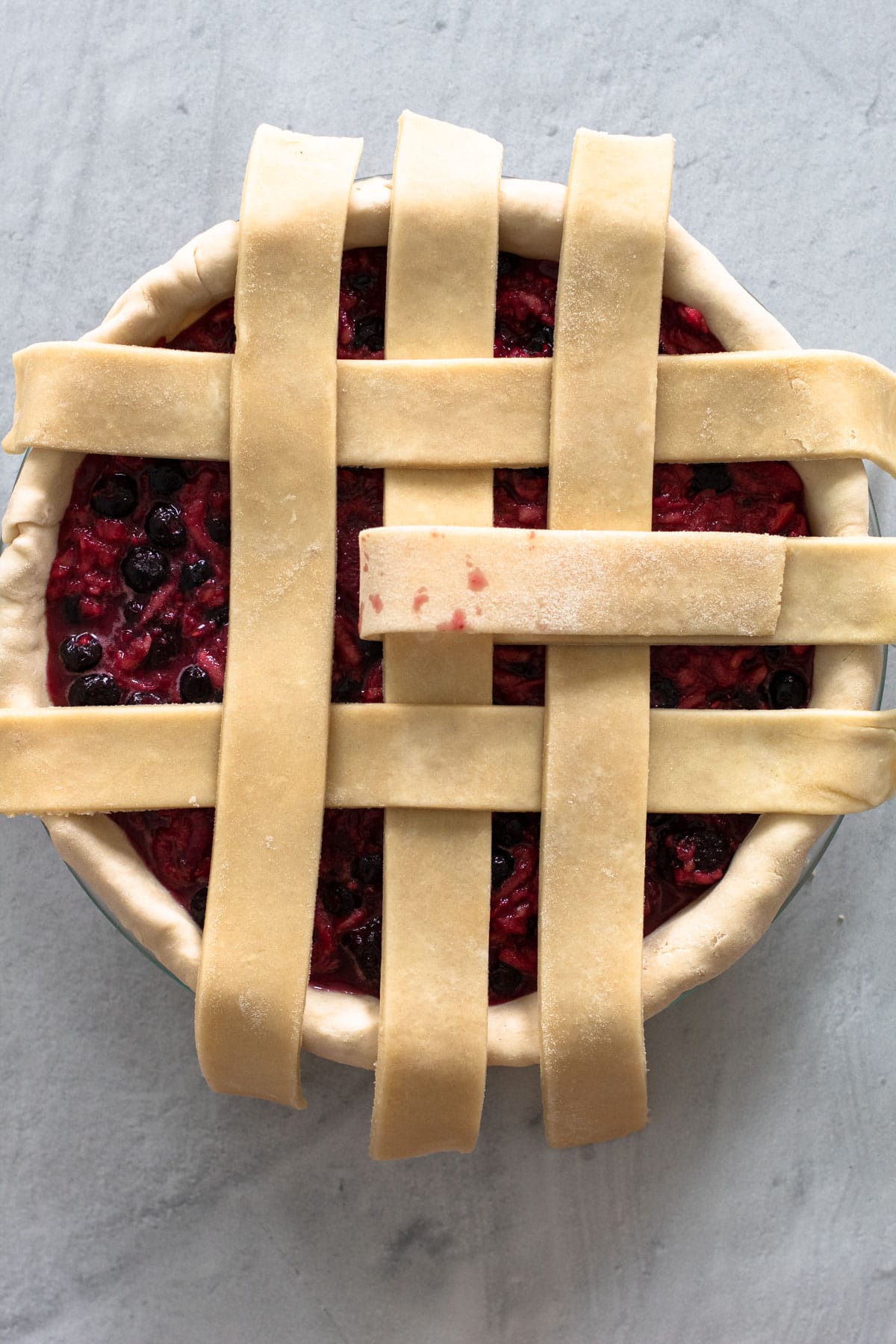 Making a lattice crust for a pie.