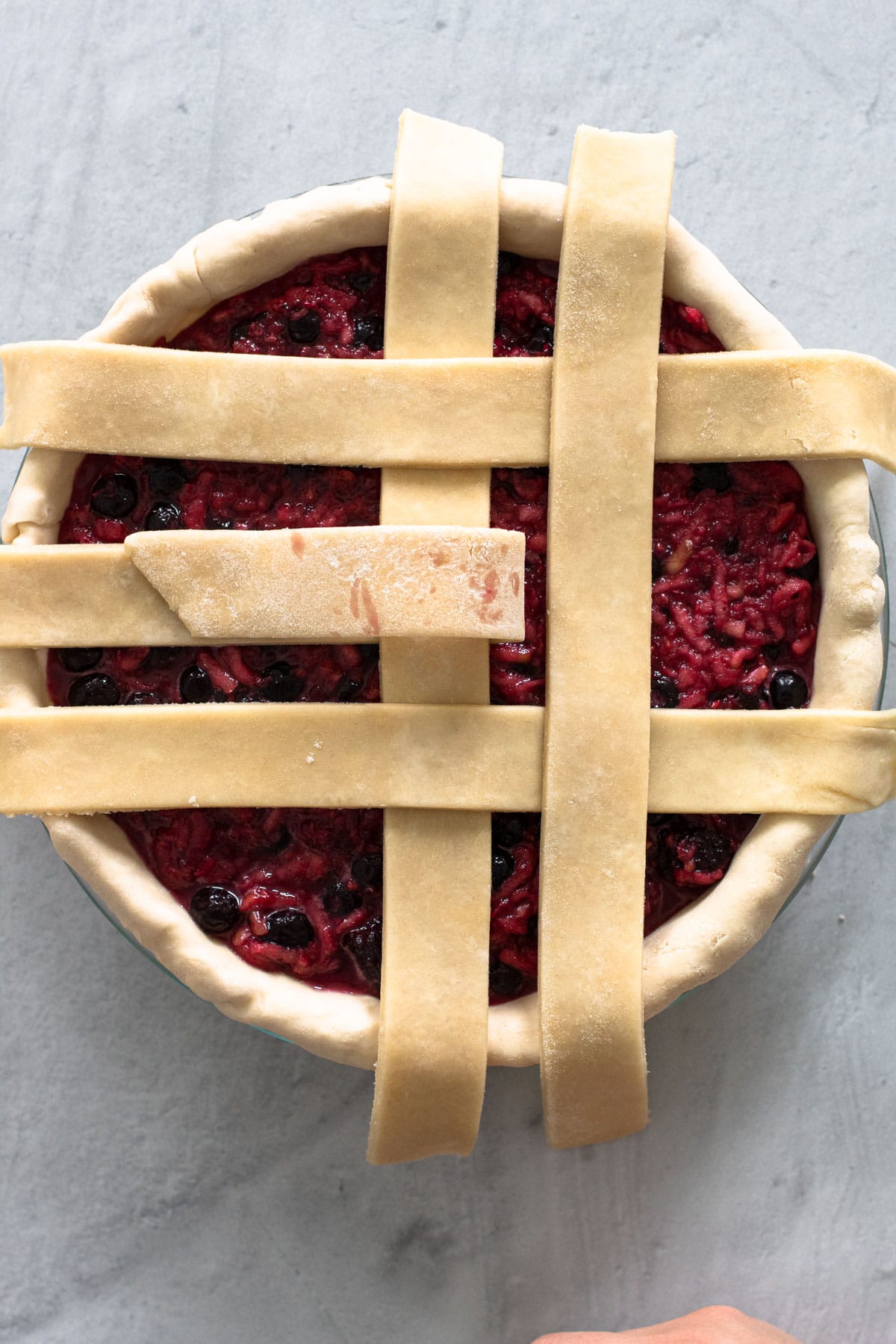 Making a lattice crust for a pie.