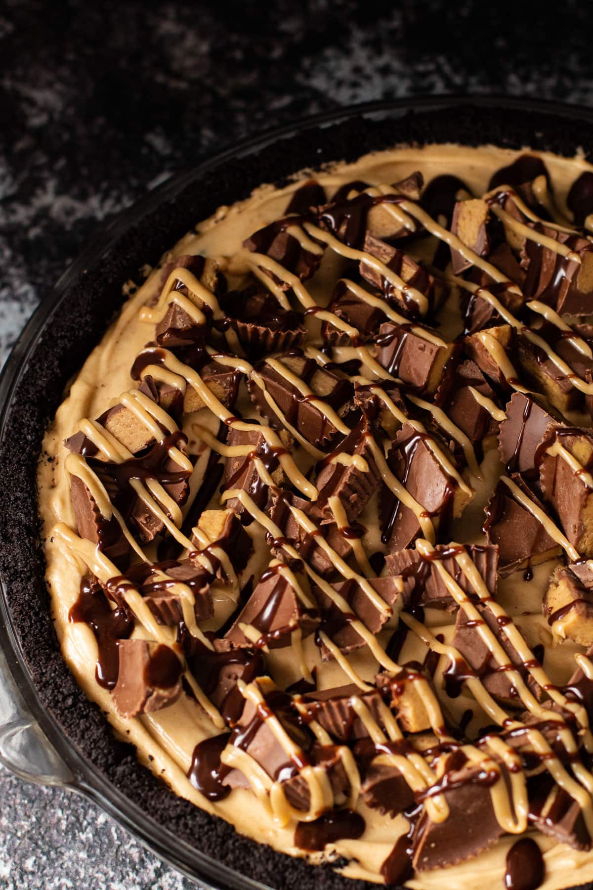 Peanutbutter pie with Reese's and peanut butter sauce.
