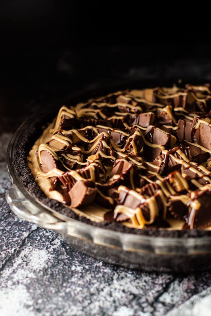 Peanut butter pie topped with peanut butter cups.