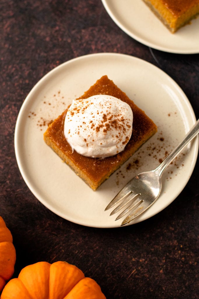 A slice of pumpkin pie bars.