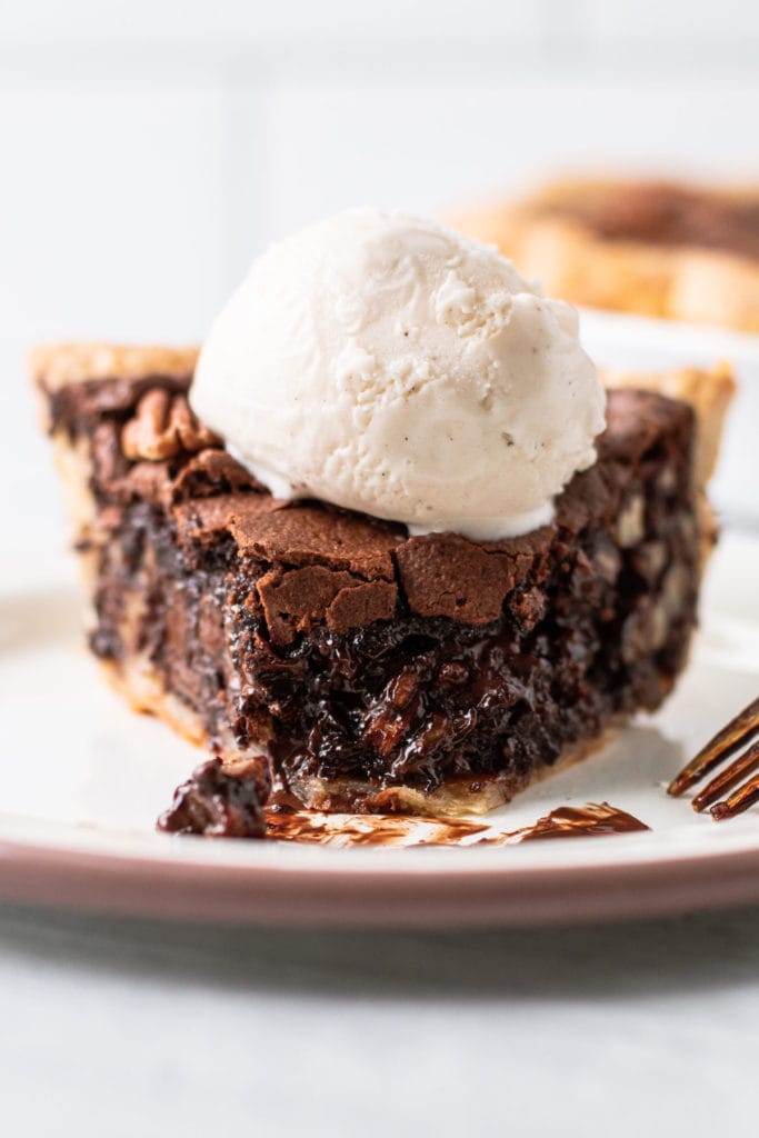 A slice of chocolate pecan pie.