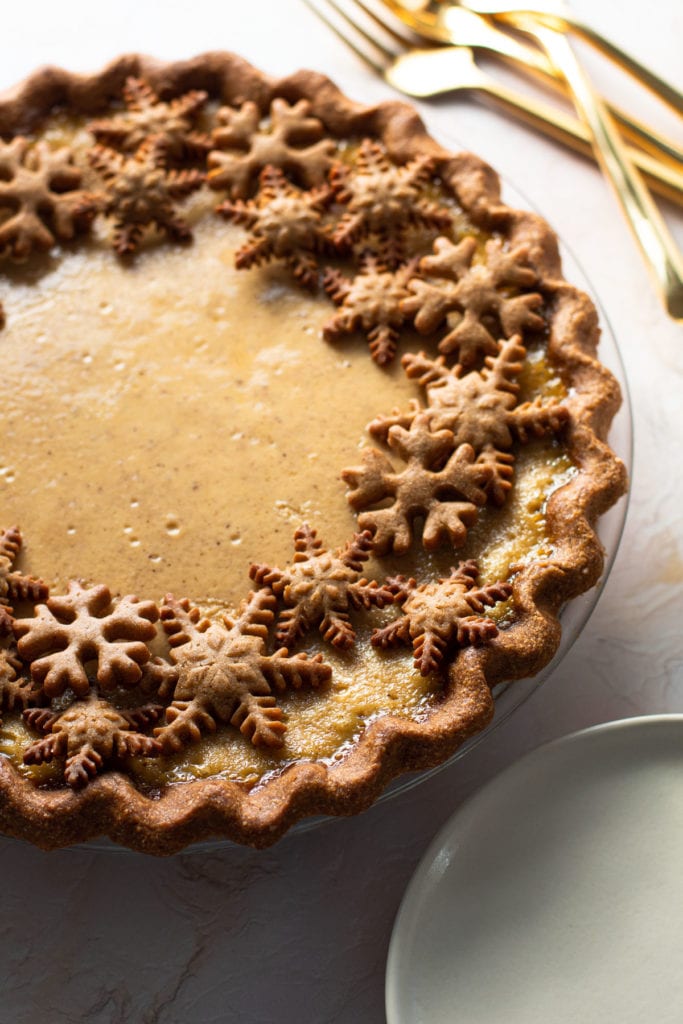 Eggnog Pie with decorative gingerbread cookies.