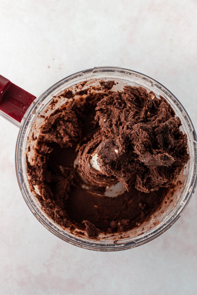 Chocolate pastry dough in the food processor.