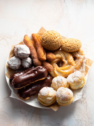 A plate of pastries made from choux pastry.