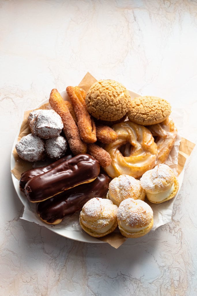 A plate of pastries made from choux pastry.