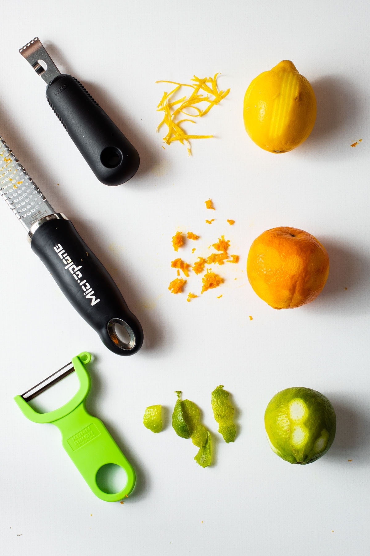 Three different zesting tools for lemons, limes and oranges.