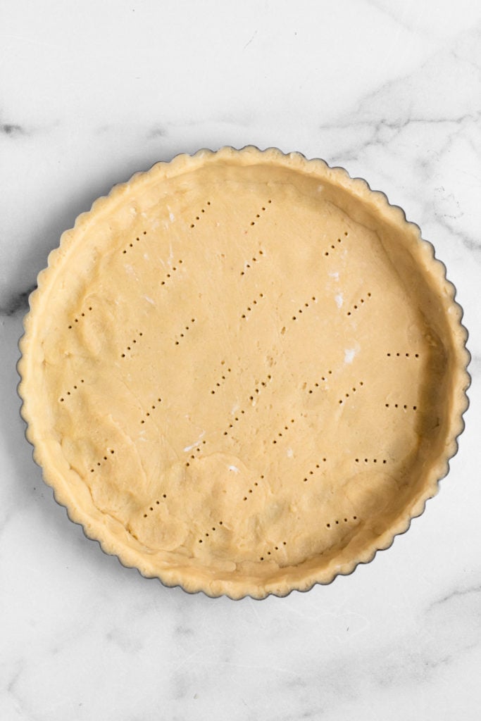 A Pate Sablee tart shell before being baked.