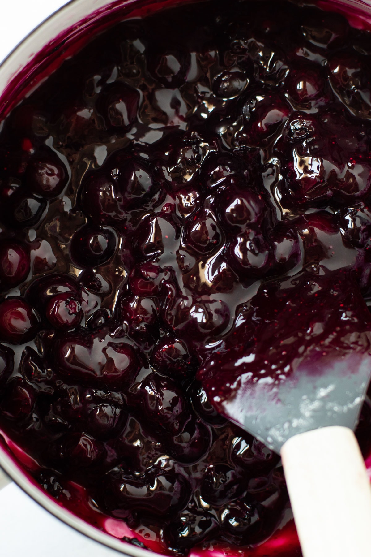 Cooked blueberry pie filling.