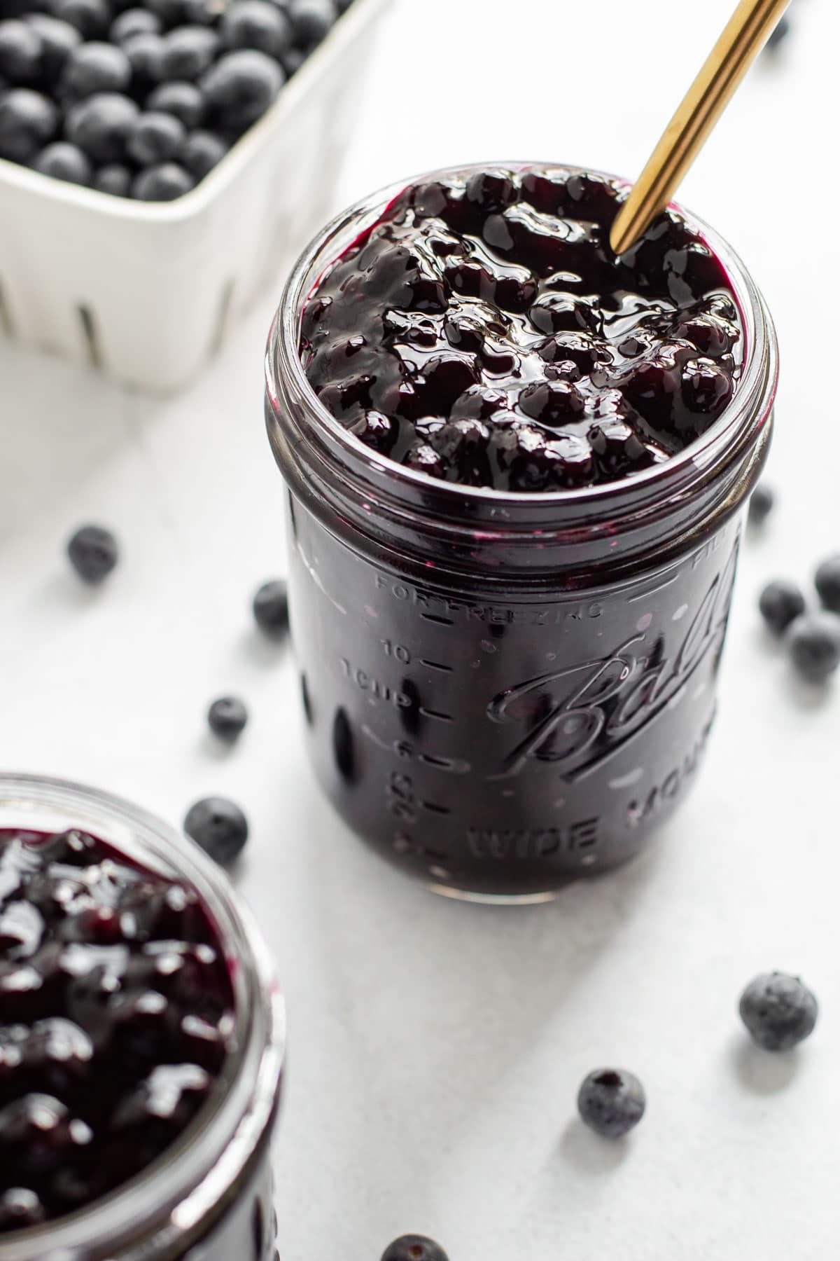 A jar of prepared blueberry pie filling.