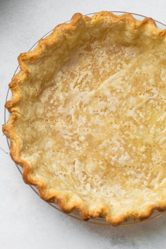 A blind baked pie crust for a zucchini pie.