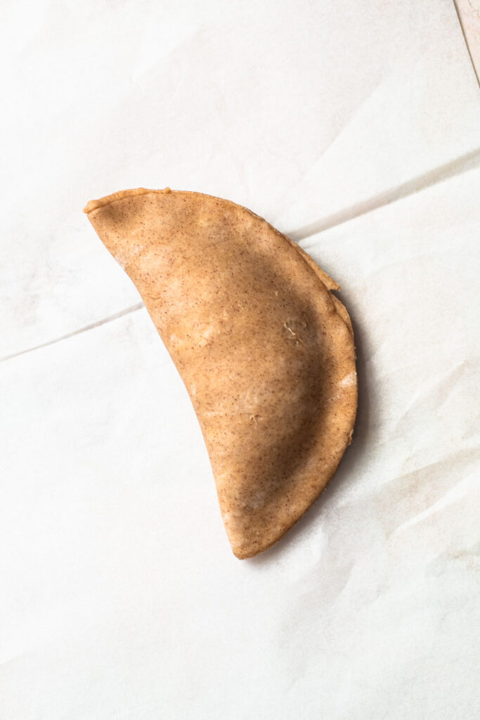 A crescent shape pumpkin pasty.