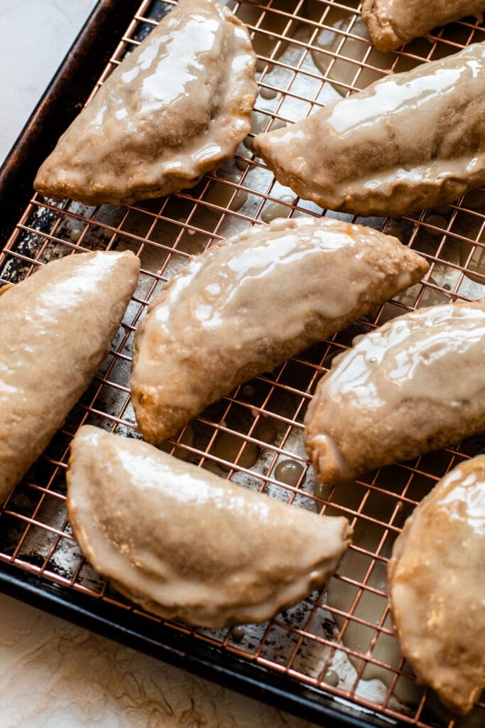 A glaze on pumpkin pasties.