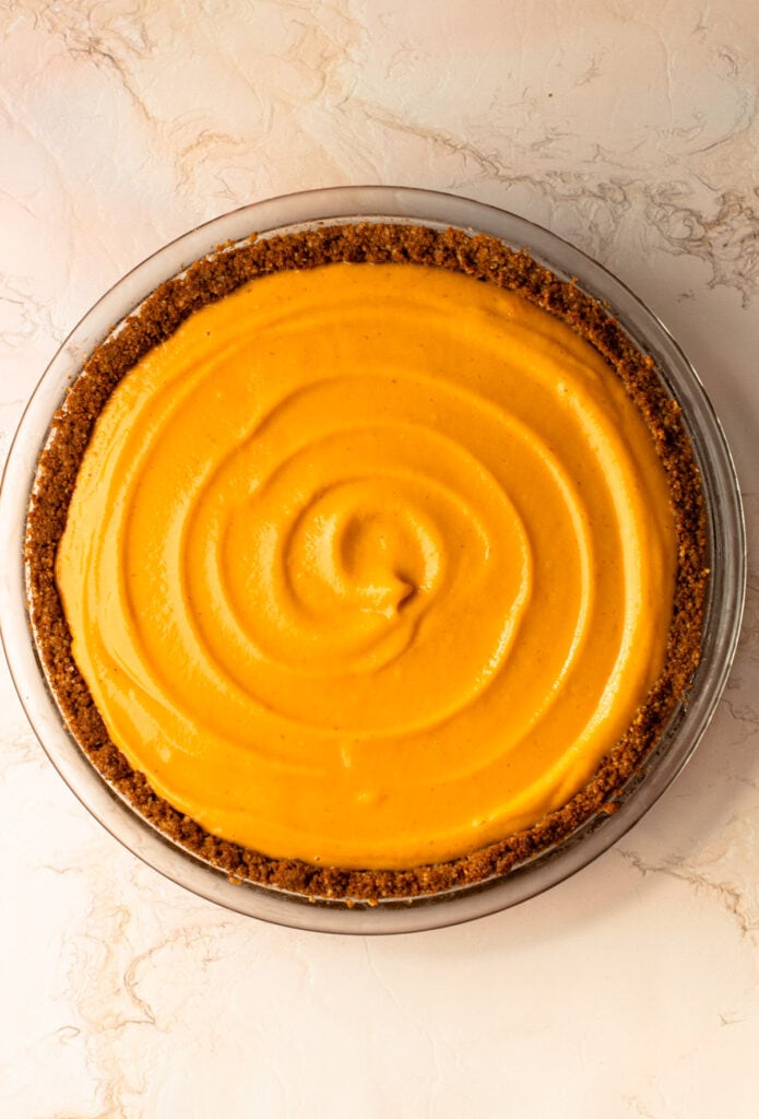 An unbaked sweet potato pie.