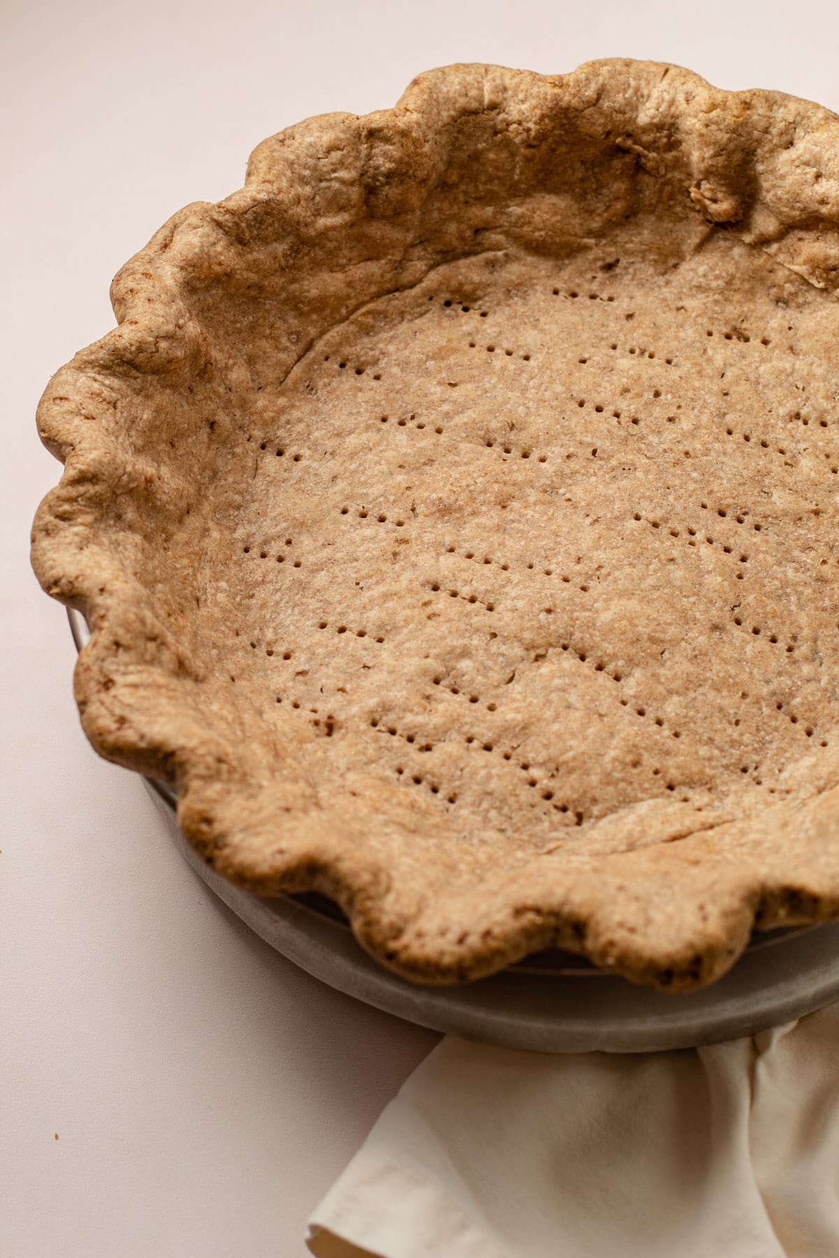 Spelt flour pie crust fully baked but not filled.
