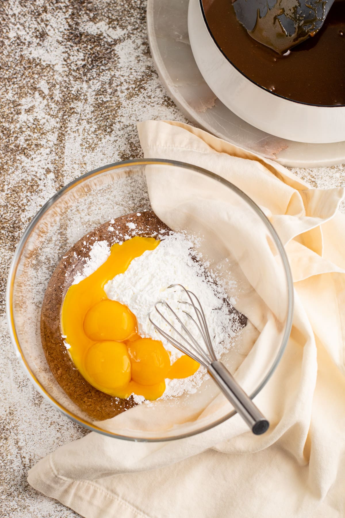 Cornstarch and egg yolks in a bowl.