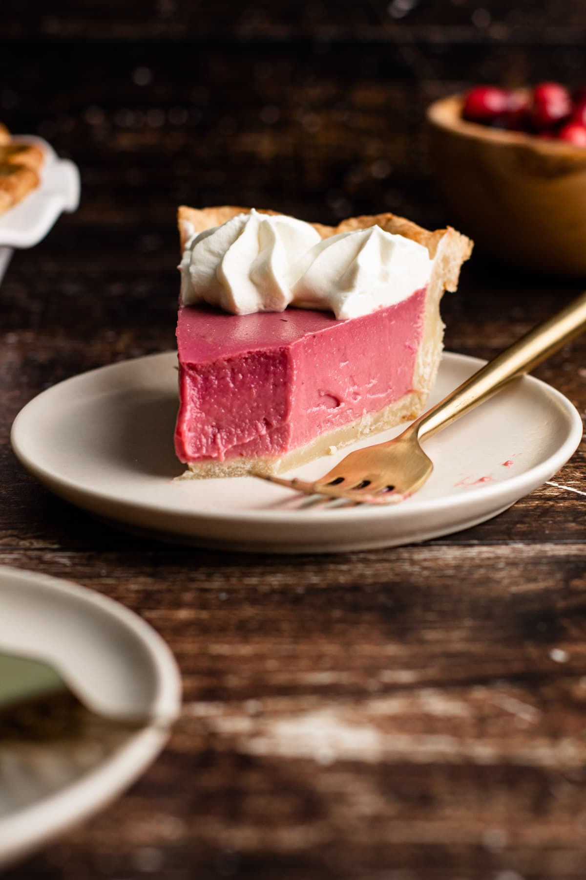 A slice of cranberry custard pie.