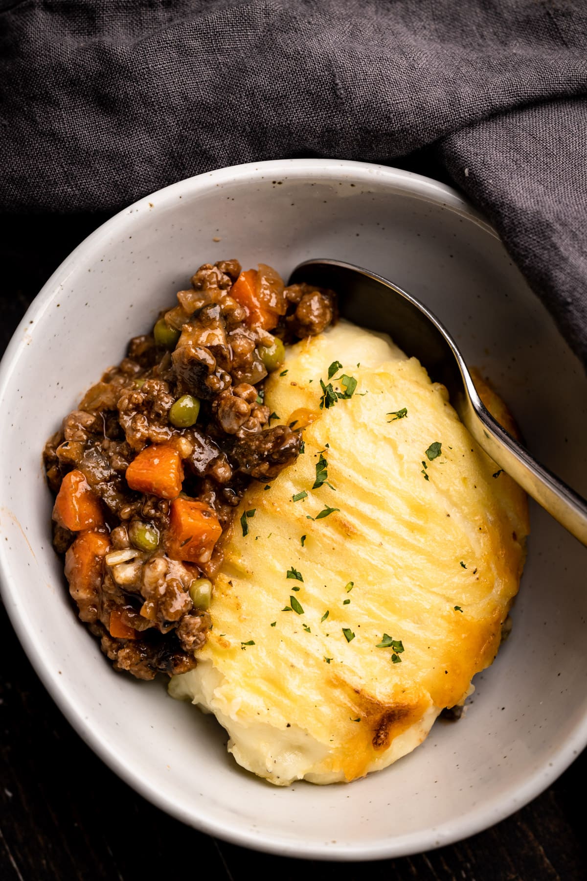 A bowl of shepherd's pie made with beef.