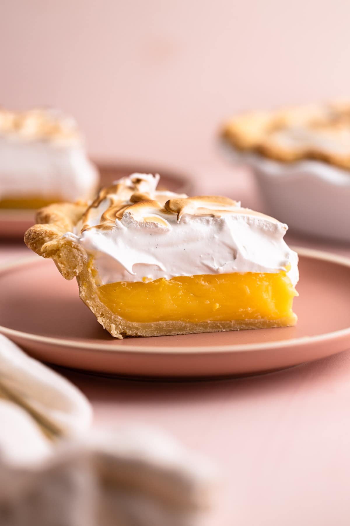 A slice of lemon meringue pie.