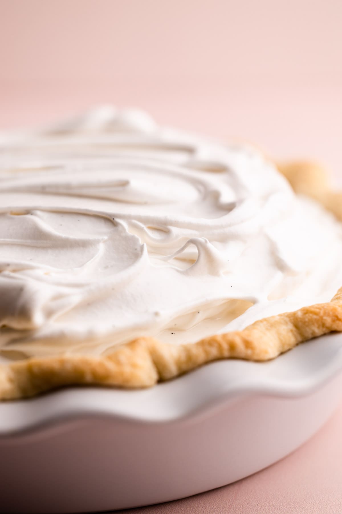 A pie with a fluffy swiss meringue on top.