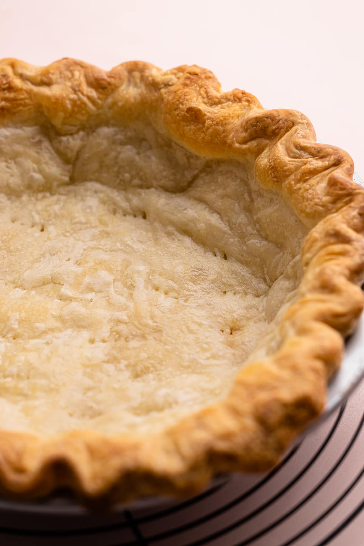 A fully blind baked pie crust.