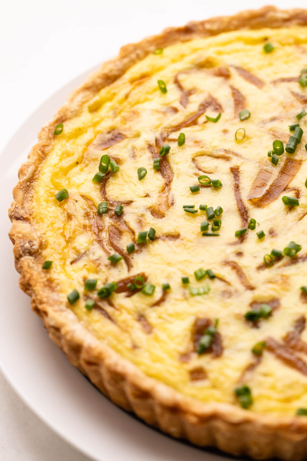 A baked caramelized onion quiche.