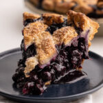 A baked blueberry pie.