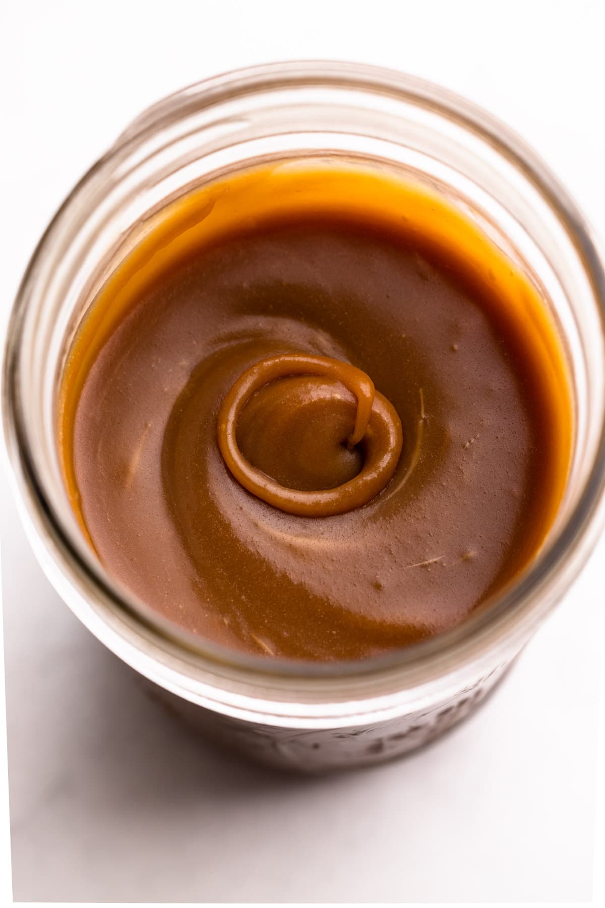 A cooled jar of caramel.