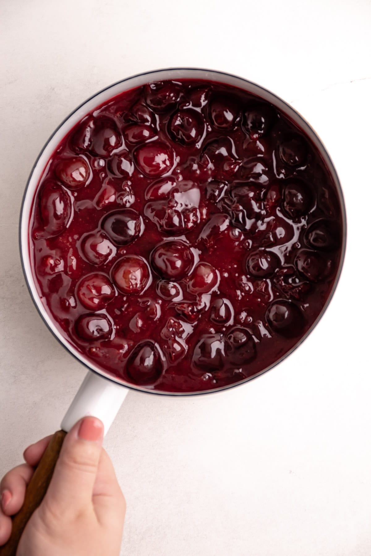 Cherry pie filling in a pot.