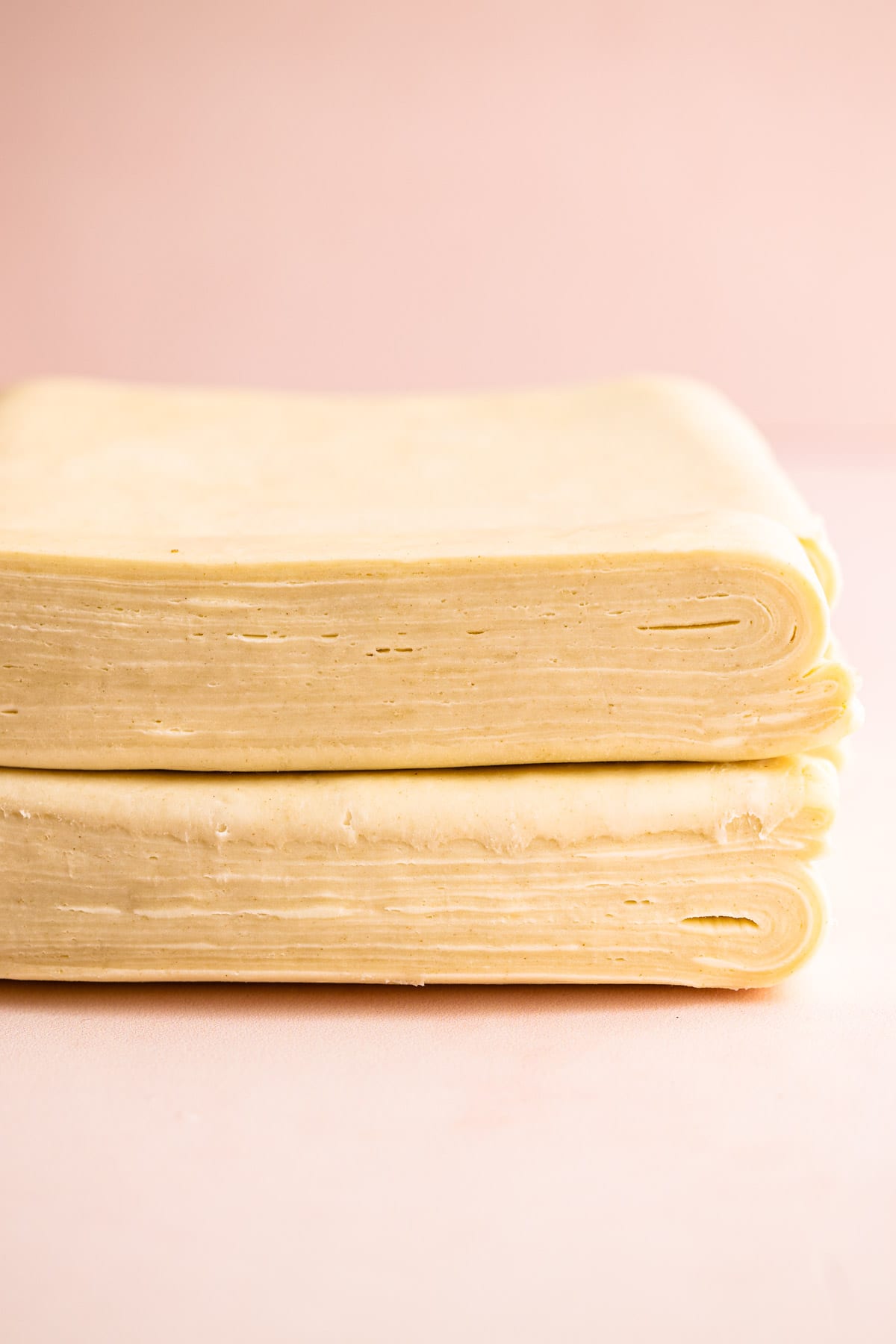 Puff pastry sliced through to reveal layers of butter and dough.