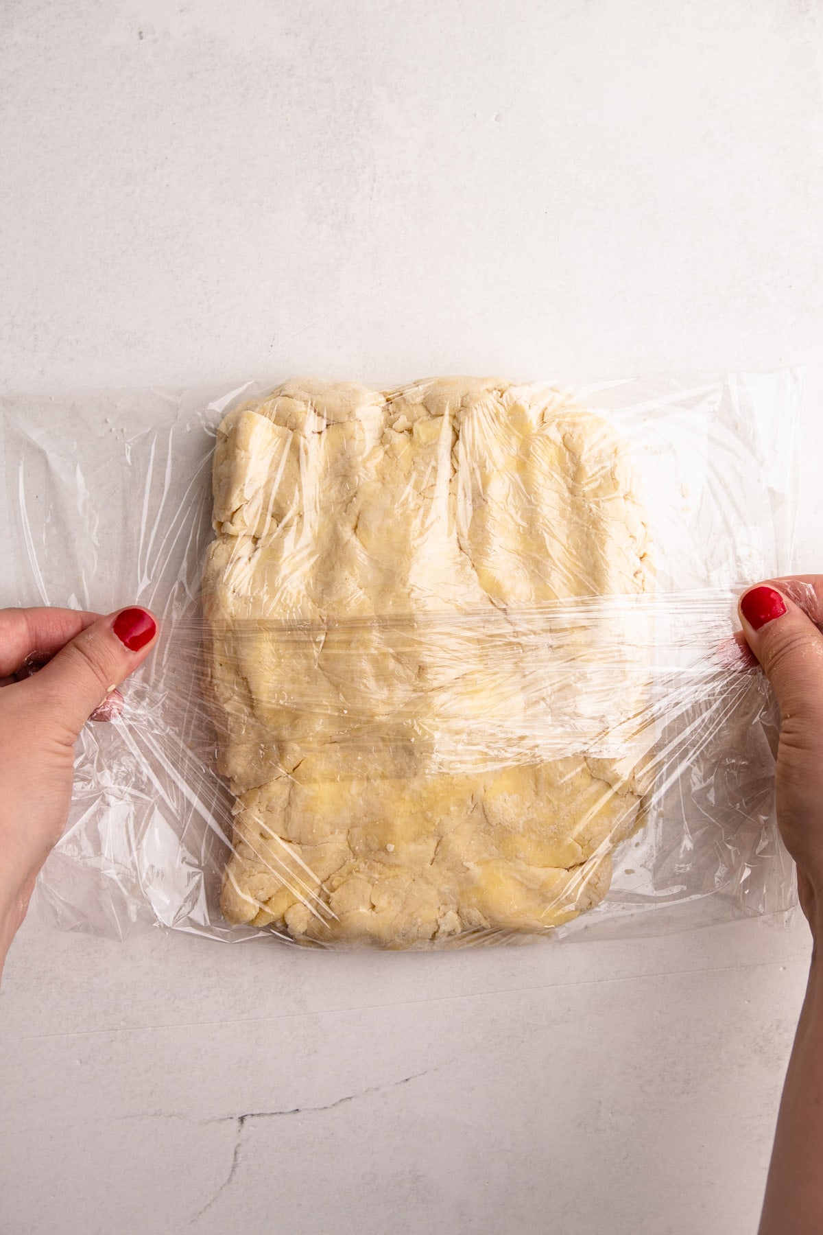 A rectangle of flaky pie dough.
