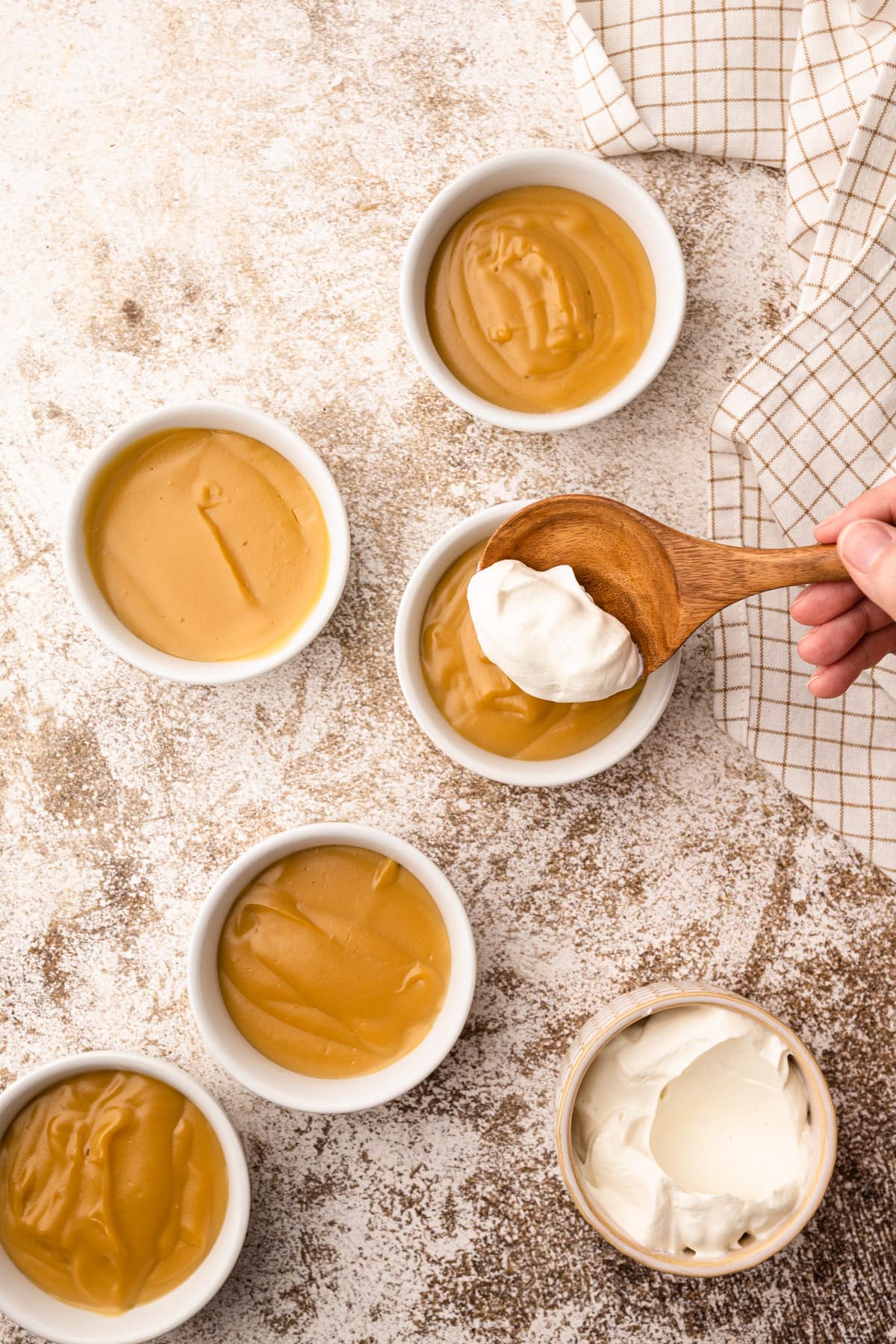 Bowls of butterscotch pudding.