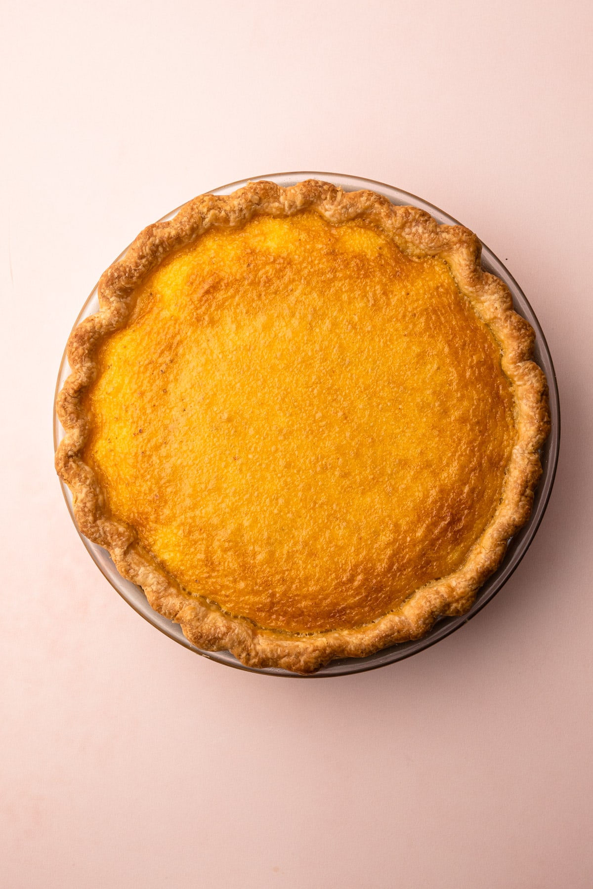 A fully baked chess pie in a pate sucree crust.