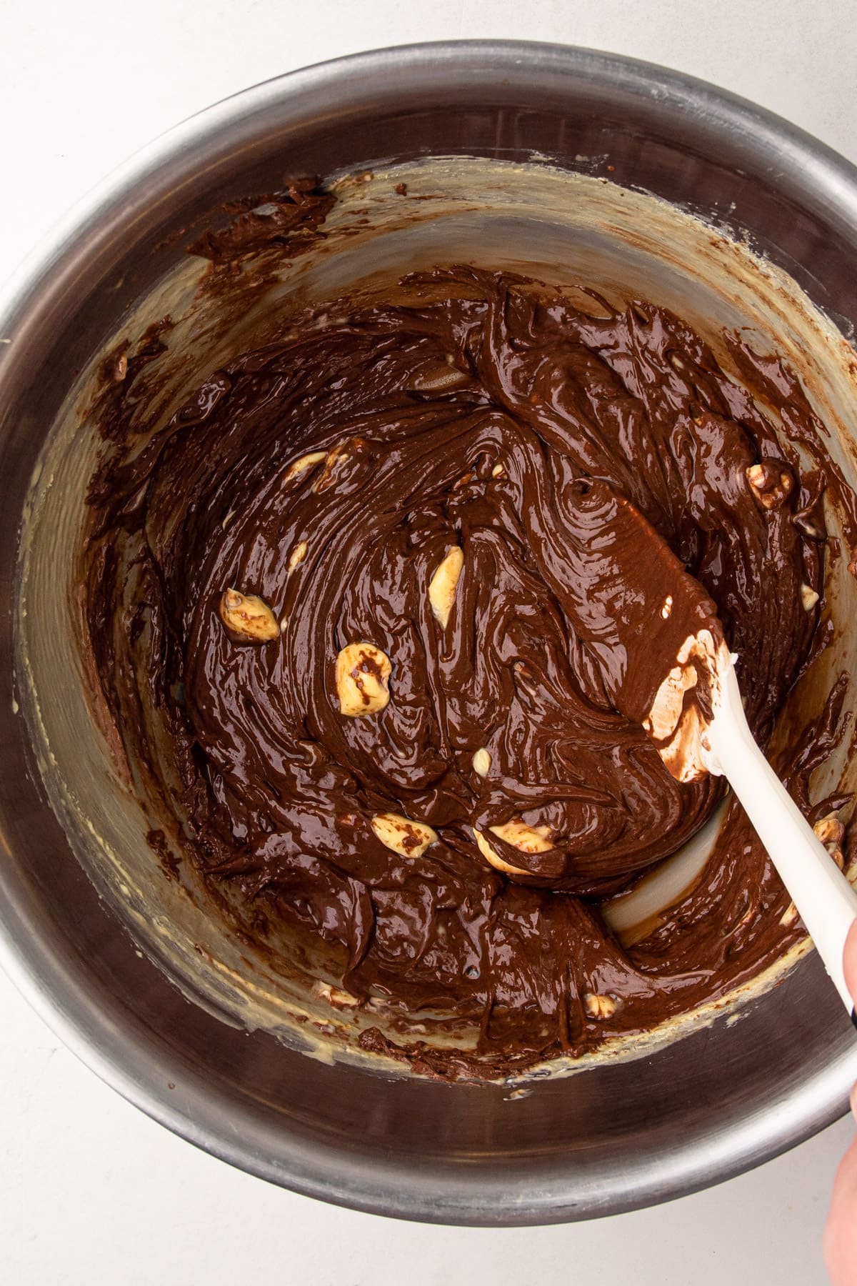 Butter melting into a chocolate mousse filling.