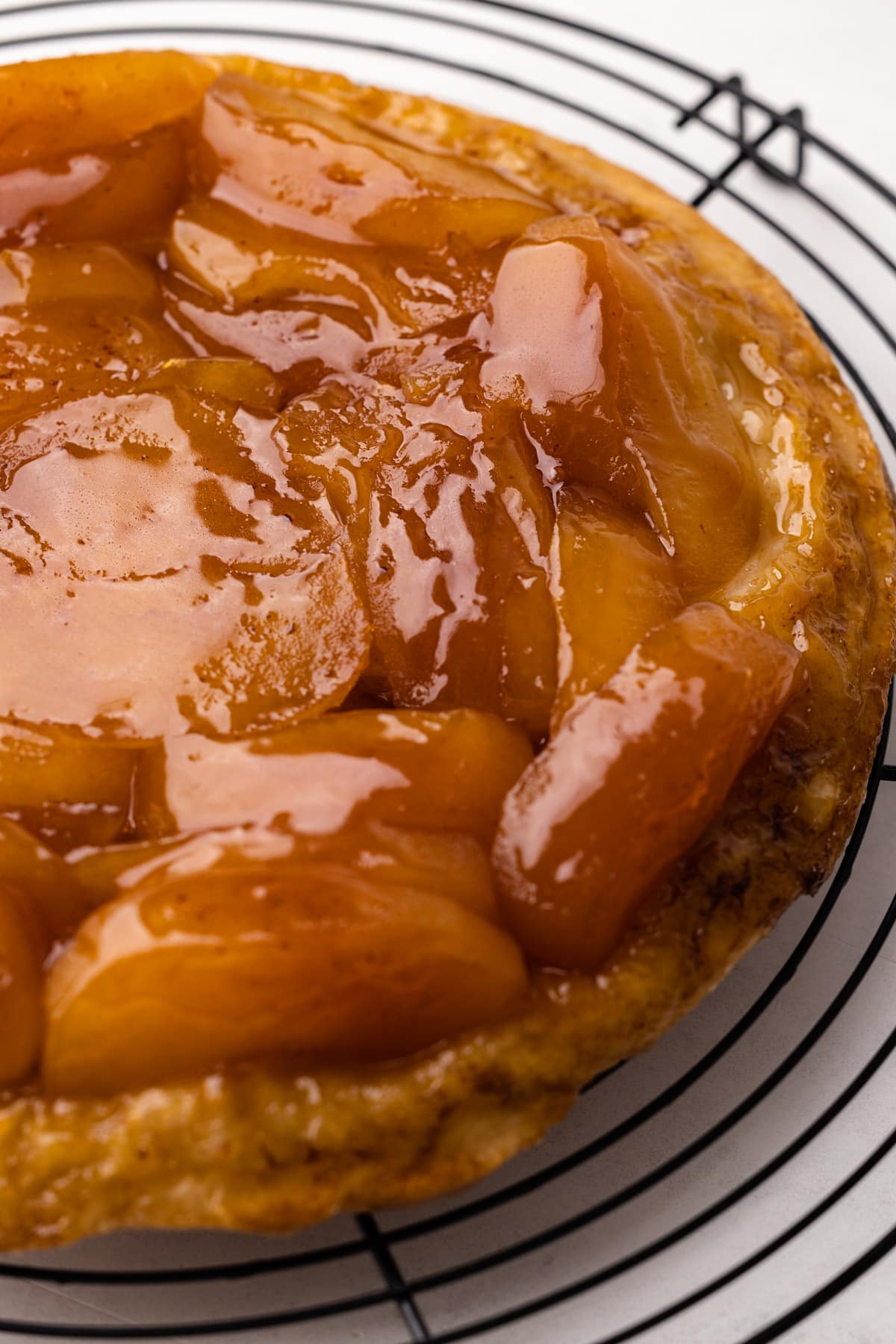 A glossy baked apple tarte tatin.