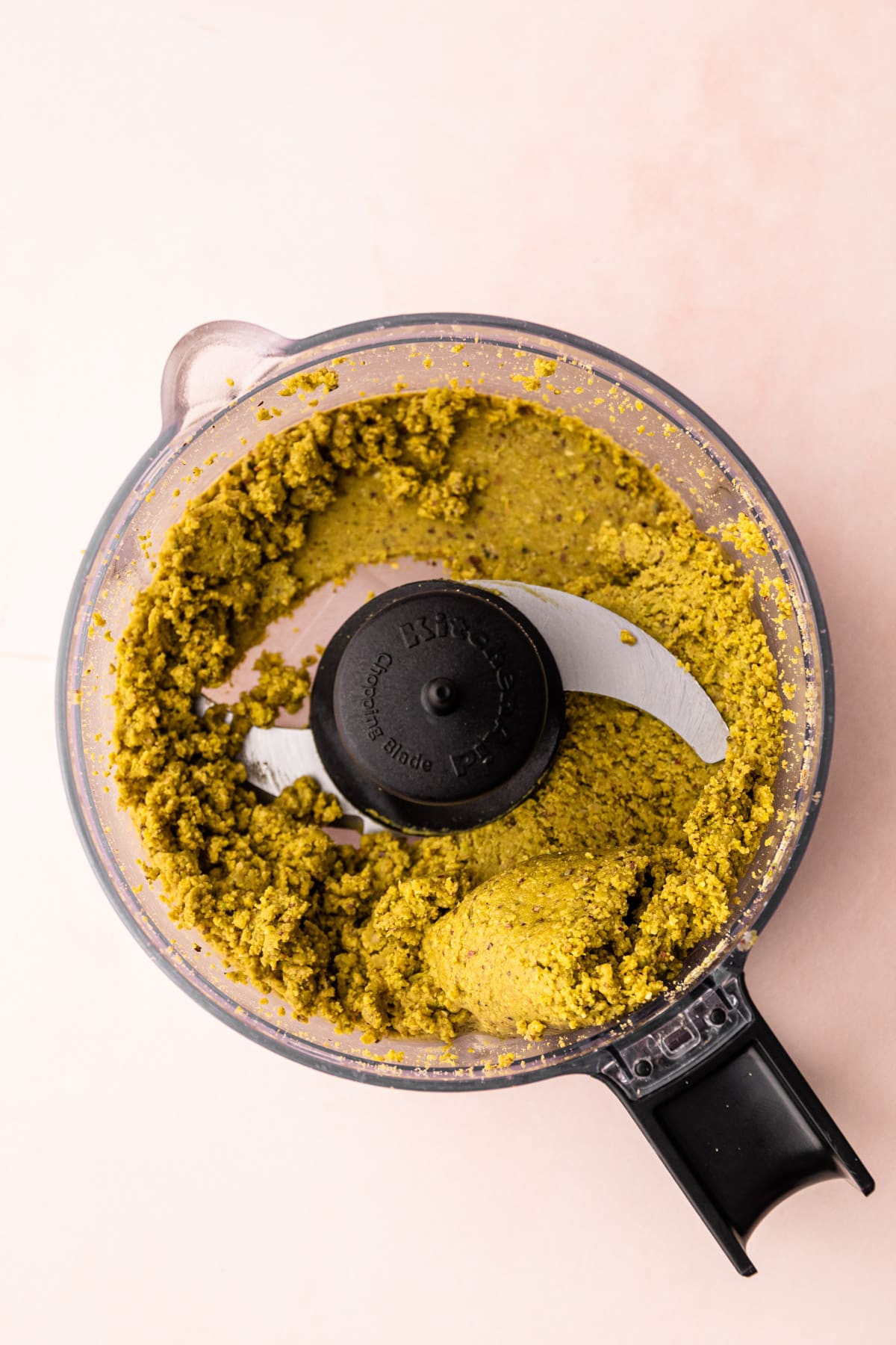 Creamy pistachios in a food processor.