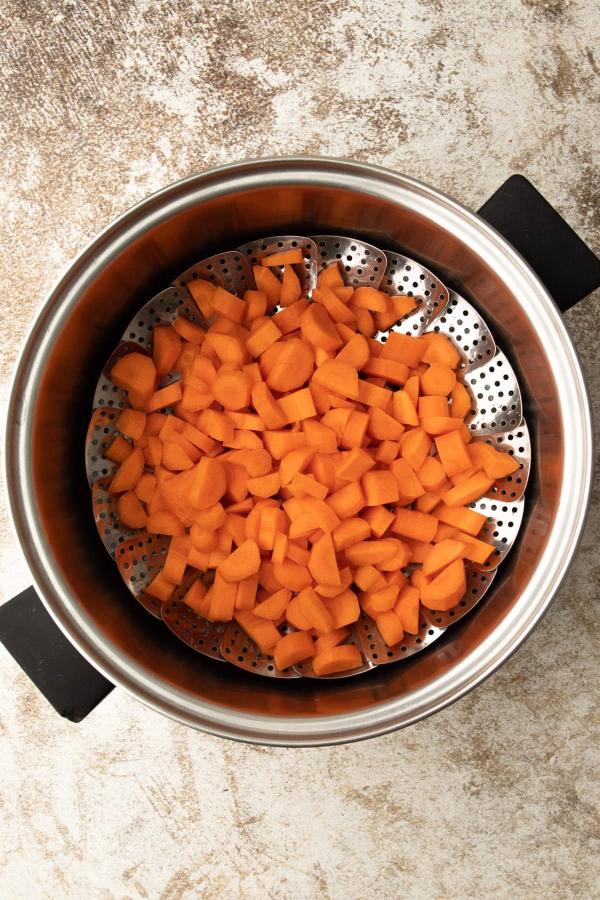 Carrots in a steamer.