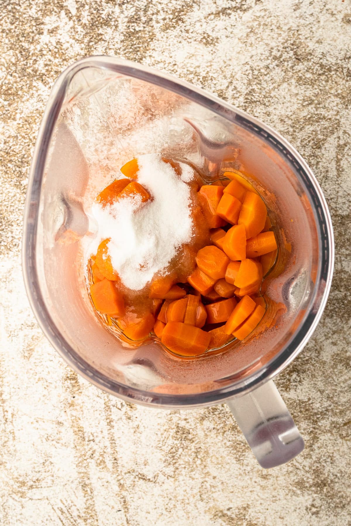 Carrots in a blender for carrot pie.