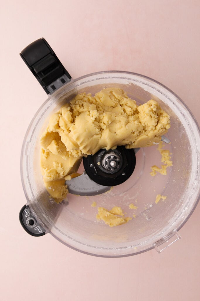 Making a sweet butter pie crust in a food processor.