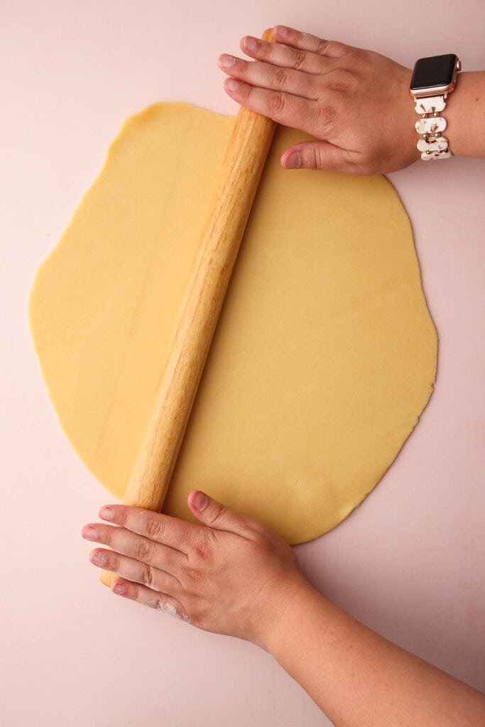 Rolling out pie crust.