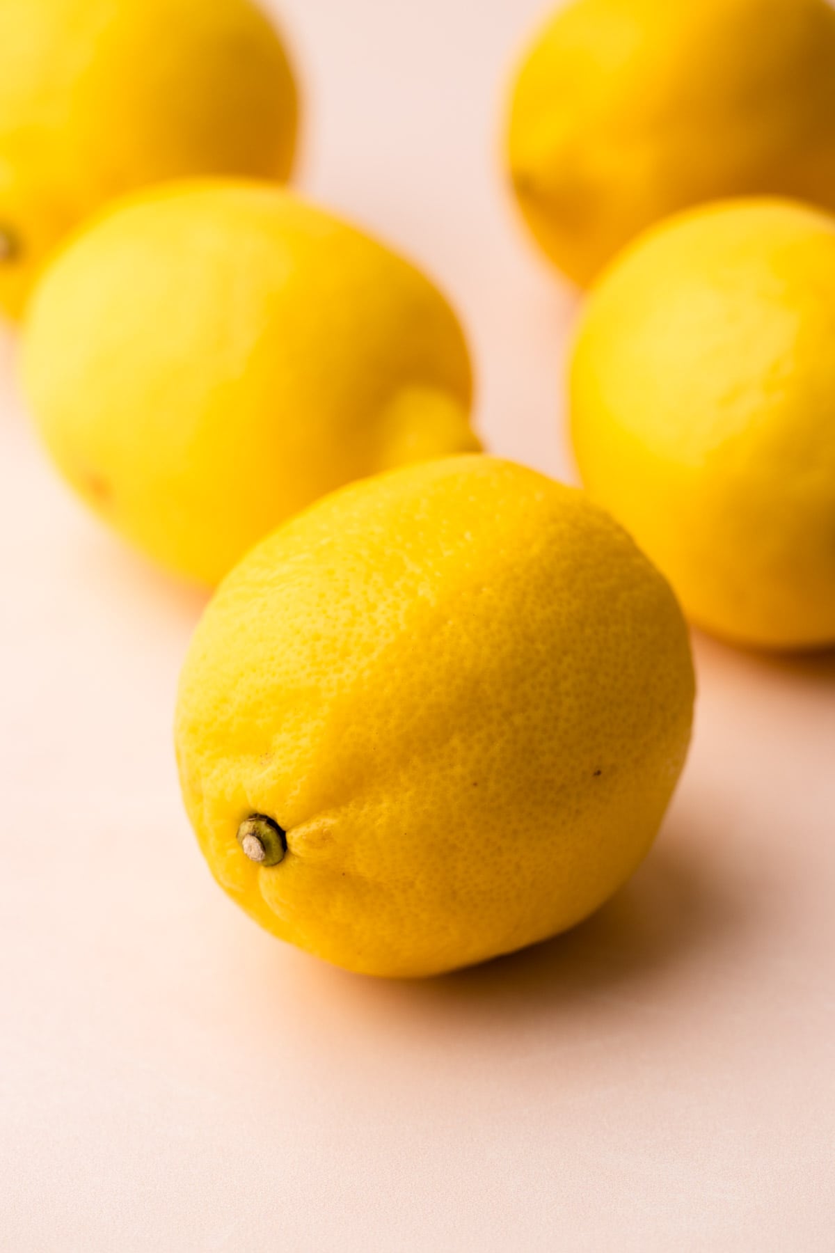 Lemons on a pink background.