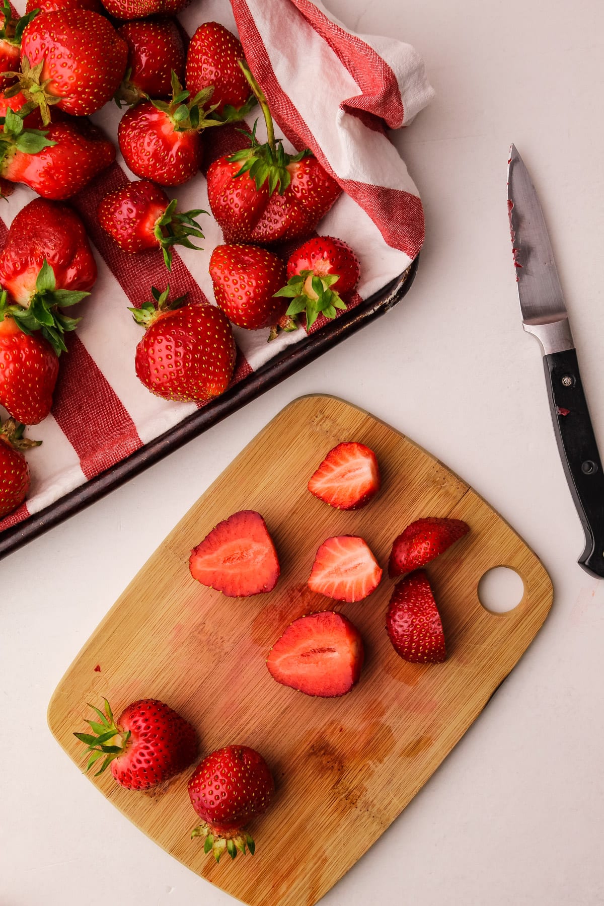 Preparing strawberries.